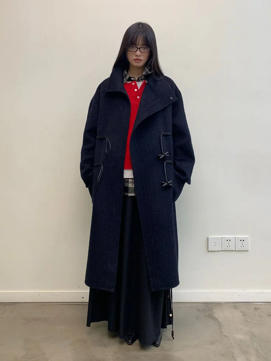 Long wool coat with diagonal placket